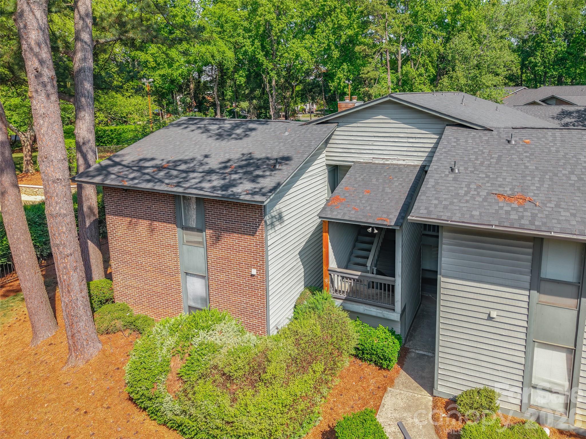 5016 Sardis Road, Unit C Charlotte, NC 28270 - Photo 22 of 25 a view of a house with a sink and yard