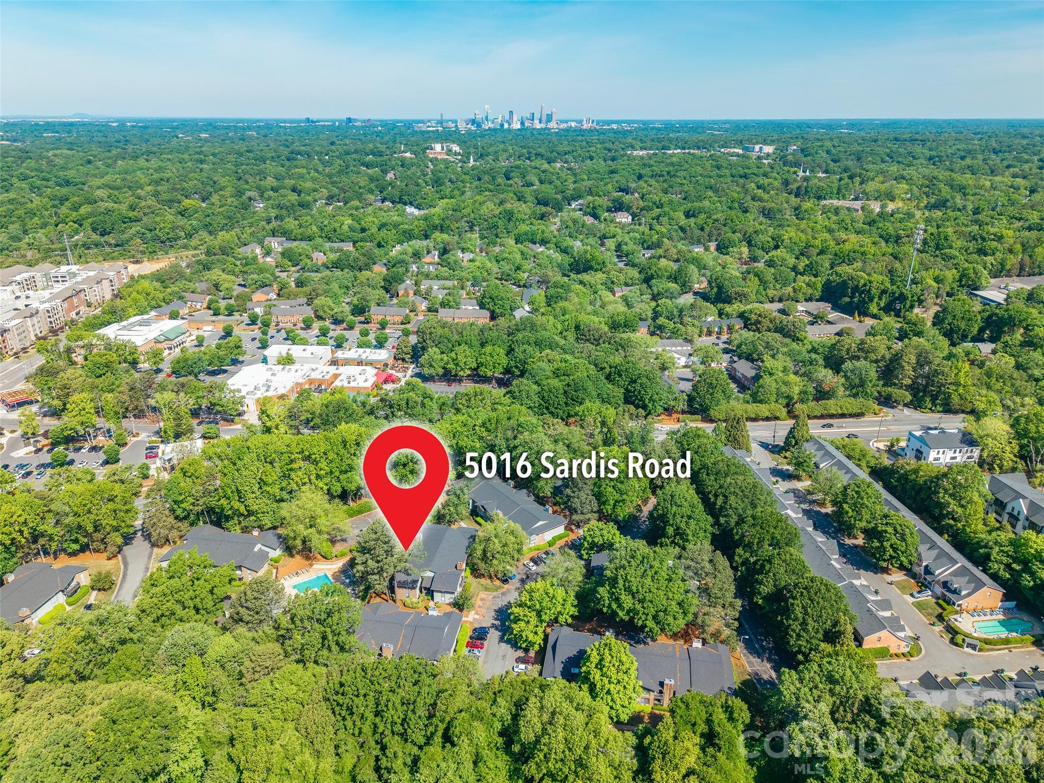 5016 Sardis Road, Unit C Charlotte, NC 28270 - Photo 25 of 25 an aerial view of residential houses with outdoor space and trees