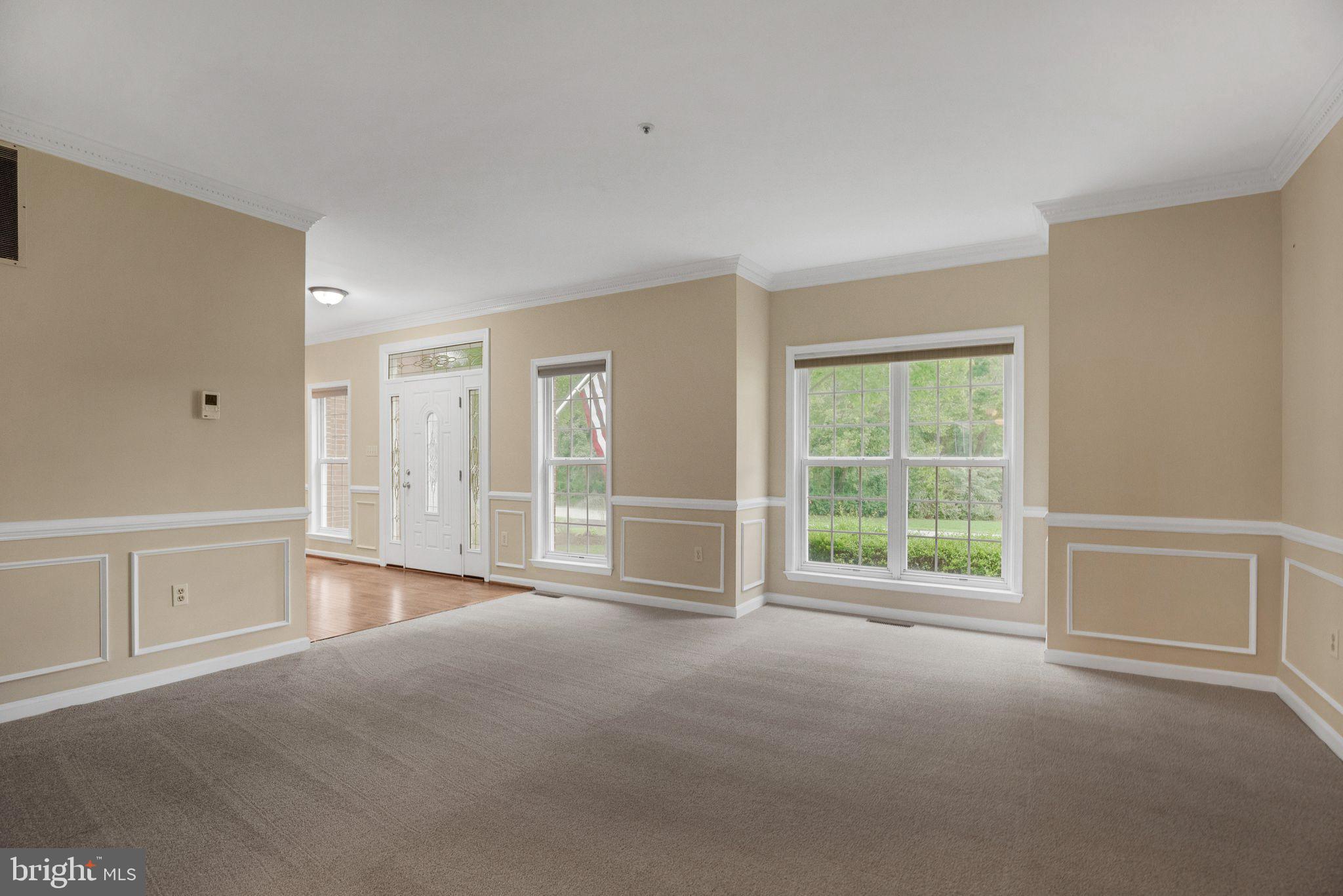 539 Small Reward Road Huntingtown, MD 20639 - Photo 5 of 34 a view of an empty room with a window