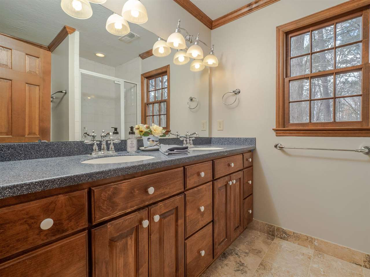 8317 Druids Lane Raleigh, NC 27613 - Photo 15 of 24 Master bathroom with large double vanity and walk in shower. Master Bathroom