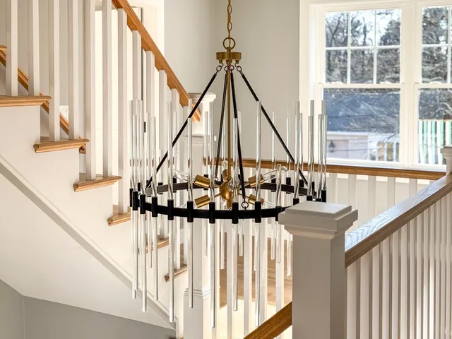 a view of staircase with wooden floor