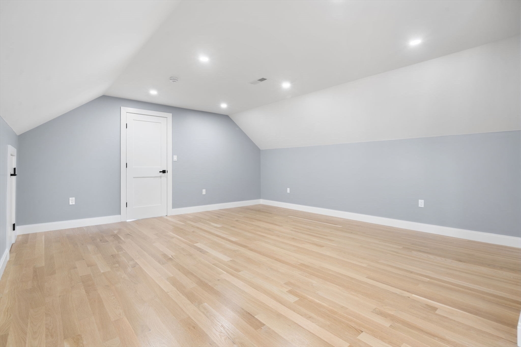 1 A Highland Way Burlington, MA 01803 - Photo 27 of 42 a view of an empty room with wooden floor