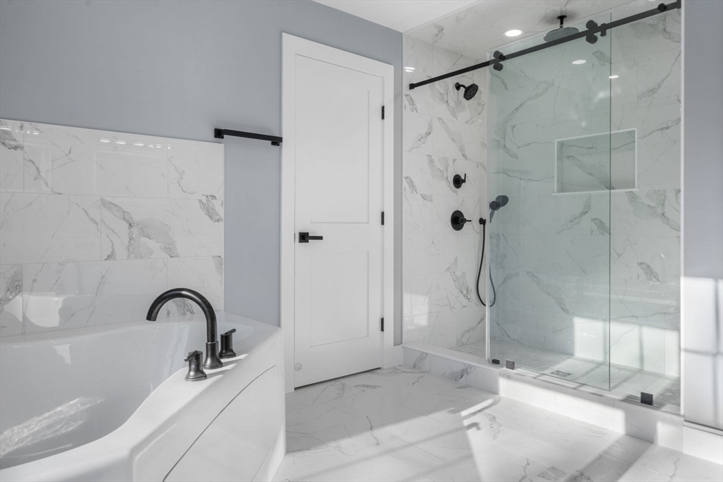 1 A Highland Way Burlington, MA 01803 - Photo 33 of 42 a bathroom with a sink and a shower