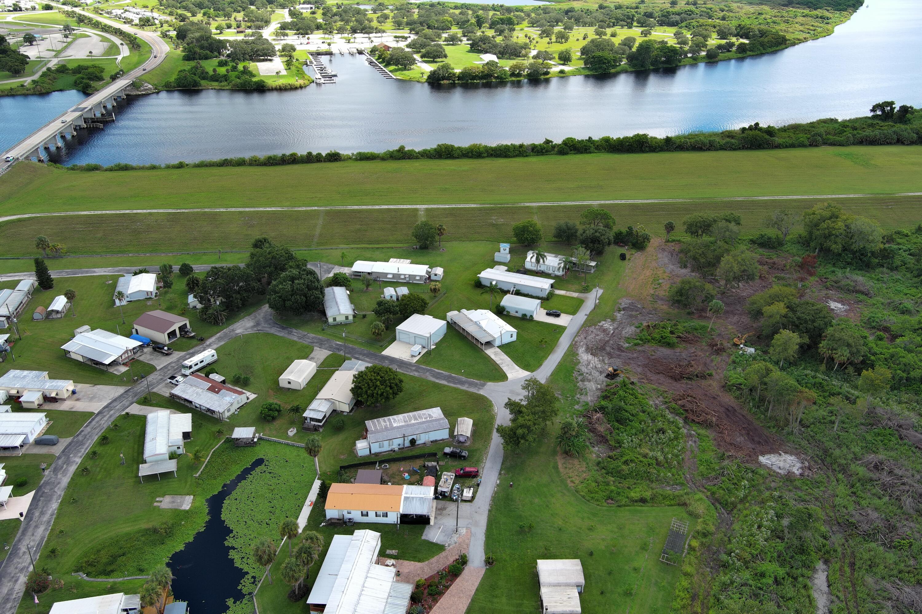 0 Perch Street Okeechobee, FL 34974 - Photo 8 of 25 an aerial view of a houses with outdoor space and lake view