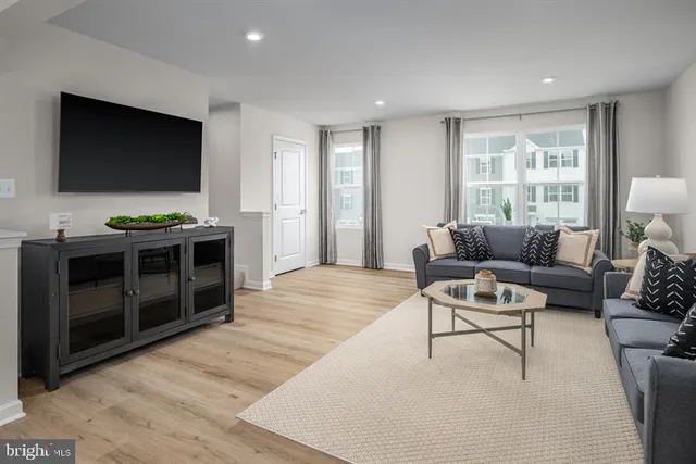 a living room with furniture and a couch