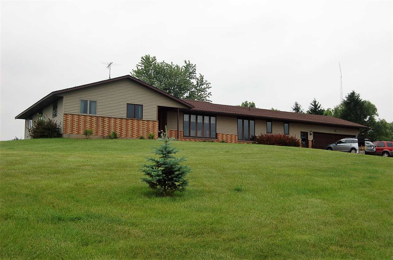 16085 West Hazelview Road Polo, IL 61064 - Photo 1 of 25 a front view of house with yard and green space