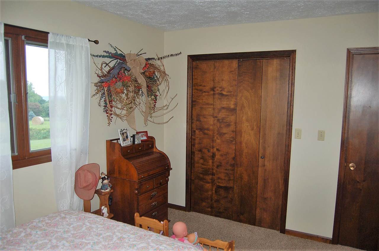 16085 West Hazelview Road Polo, IL 61064 - Photo 15 of 25 a living room with furniture and a window
