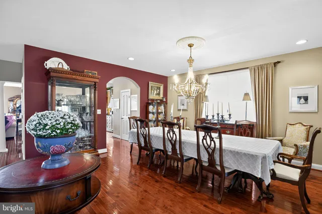 a bed room with a bed and a chair