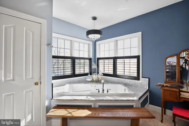 a workspace with furniture and a flat screen tv