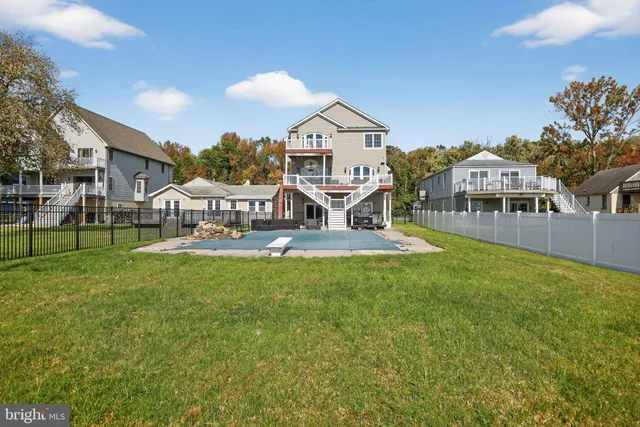 a view of livingroom with furniture and workspace