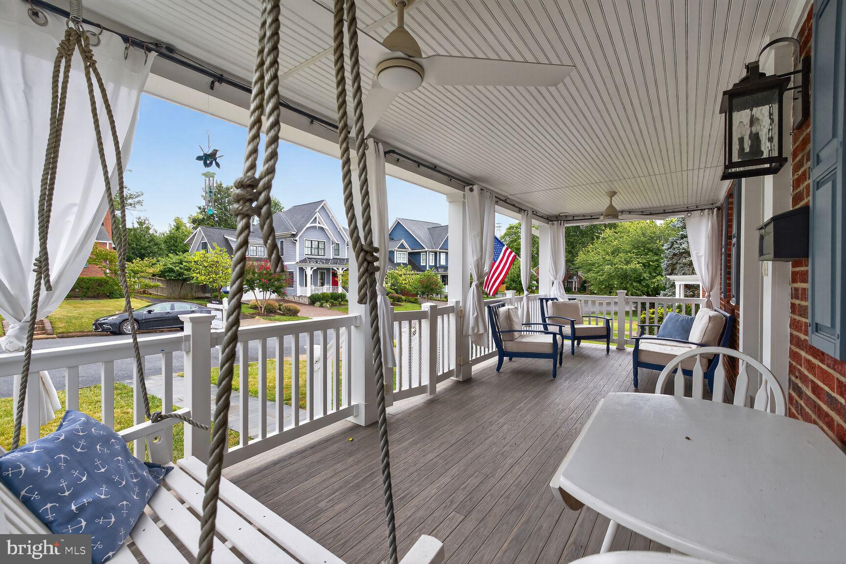 5021 25th Road North Arlington, VA 22207 - Photo 22 of 35 a view of a patio with a table chairs and a potted plant