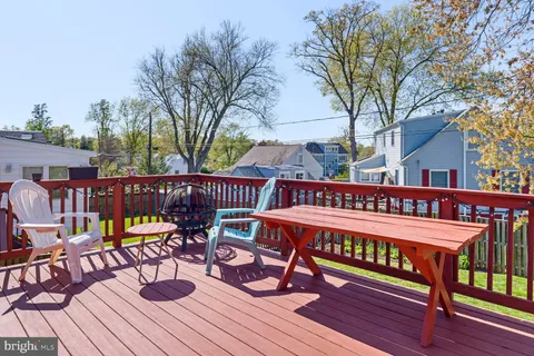 a view of a chairs on wooden deck