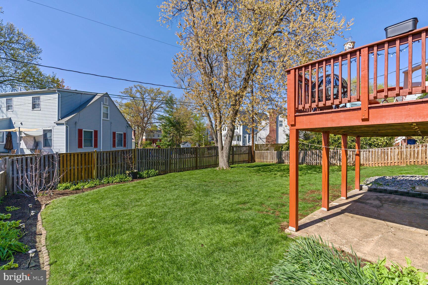 5021 25th Road North Arlington, VA 22207 - Photo 30 of 35 a view of a house with a yard and plants