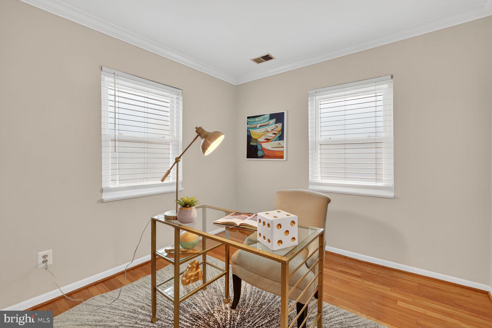 5021 25th Road North Arlington, VA 22207 - Photo 9 of 35 a dining room with furniture and wooden floor