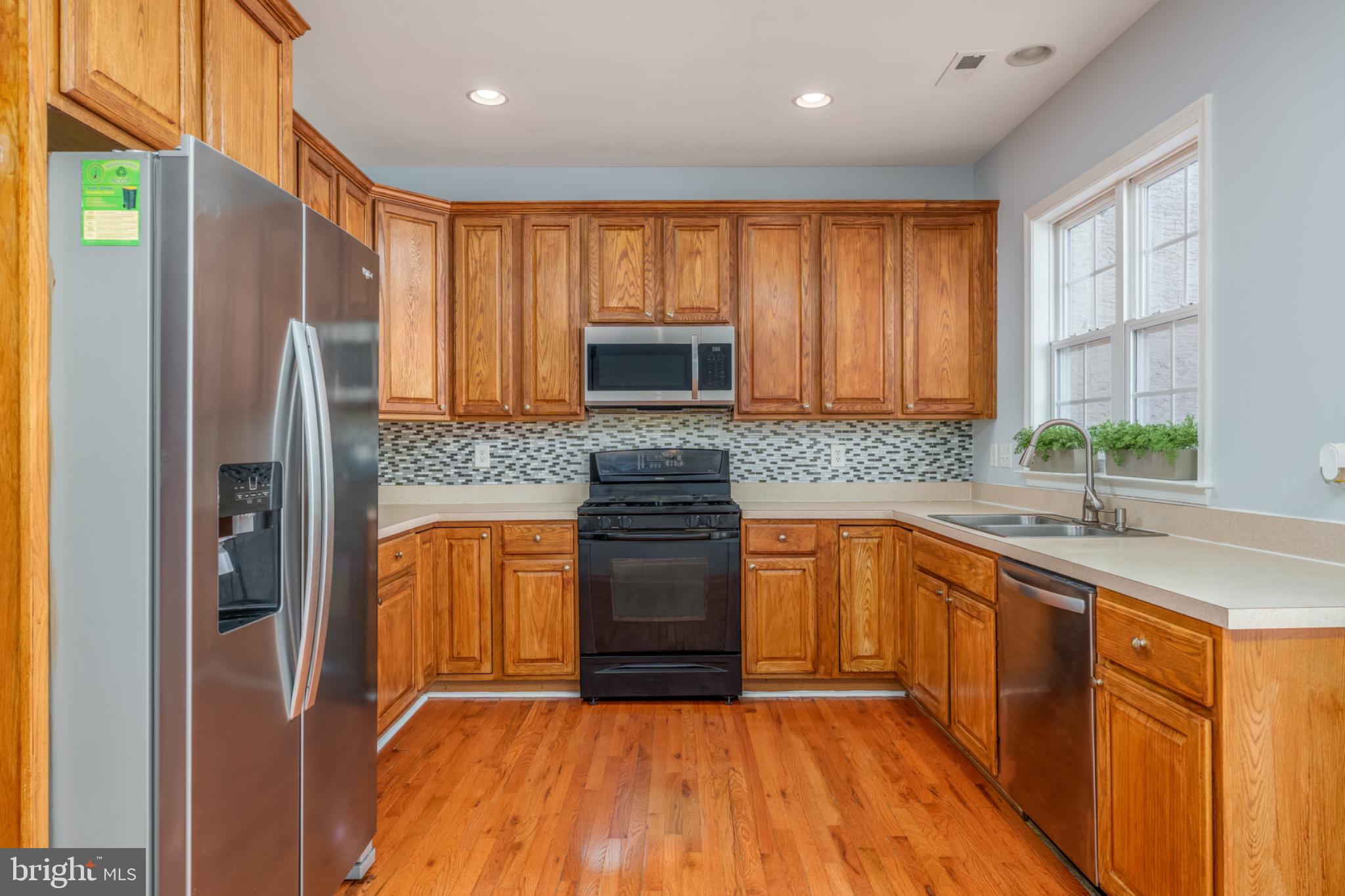 167 Springfield Circle Middletown, DE 19709 - Photo 10 of 33 Modern kitchen with warm wood accents.