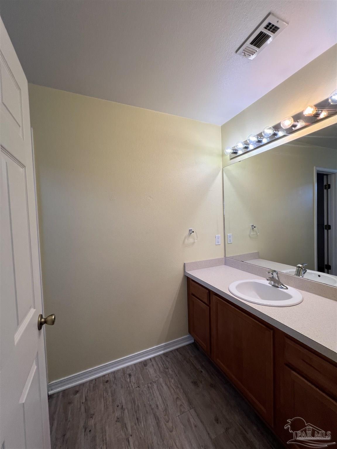 120 Nivana Drive Crestview, FL 32536 - Photo 16 of 20 a bathroom with a sink and a mirror