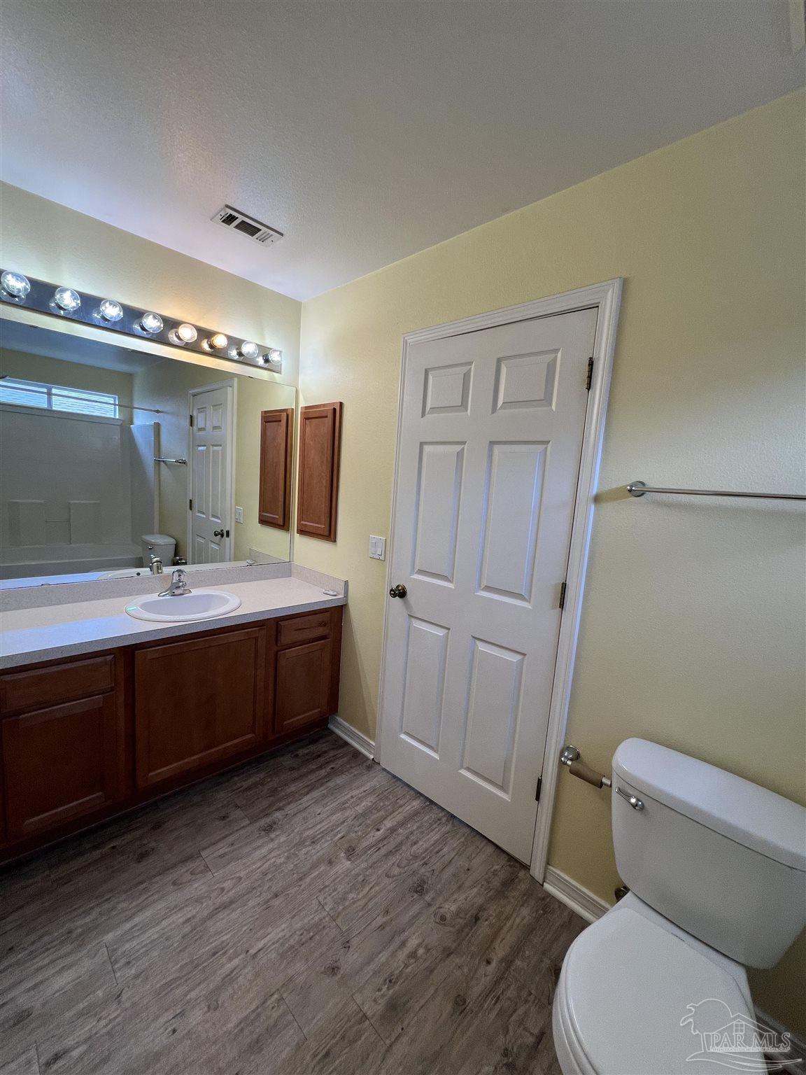 120 Nivana Drive Crestview, FL 32536 - Photo 19 of 20 a bathroom with a double vanity sink mirror and toilet