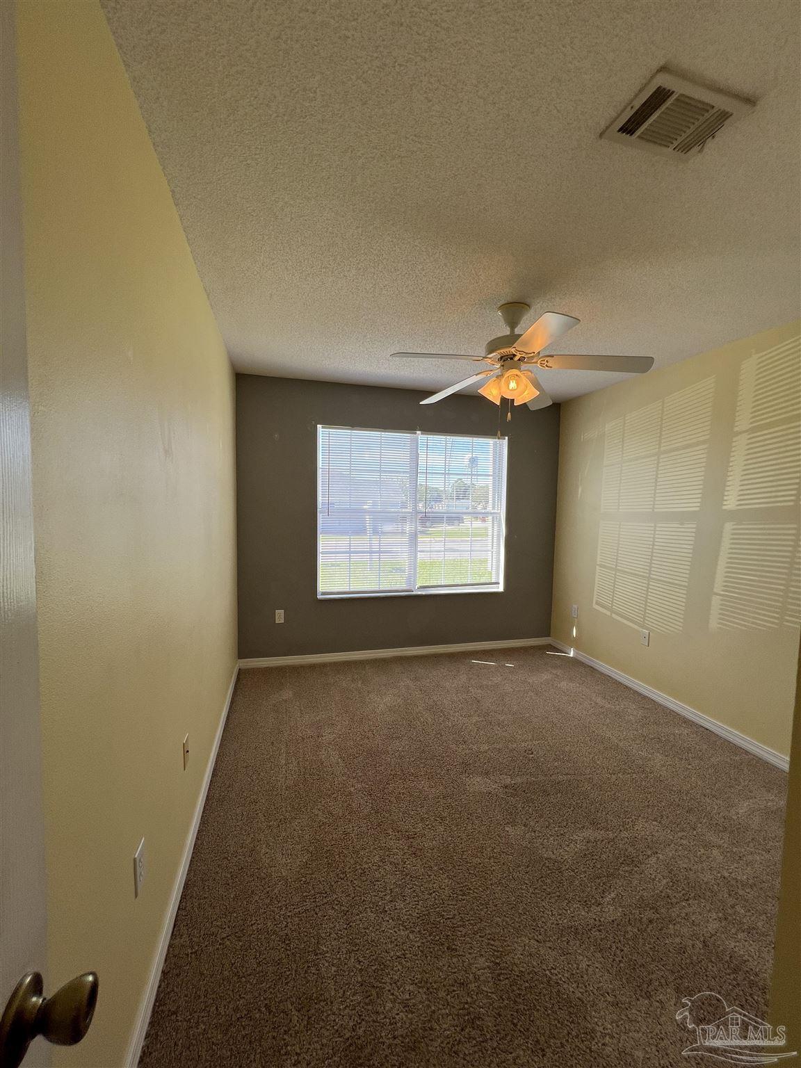 120 Nivana Drive Crestview, FL 32536 - Photo 8 of 20 a view of an empty room with a window