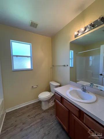 a bathroom with a sink and a toilet