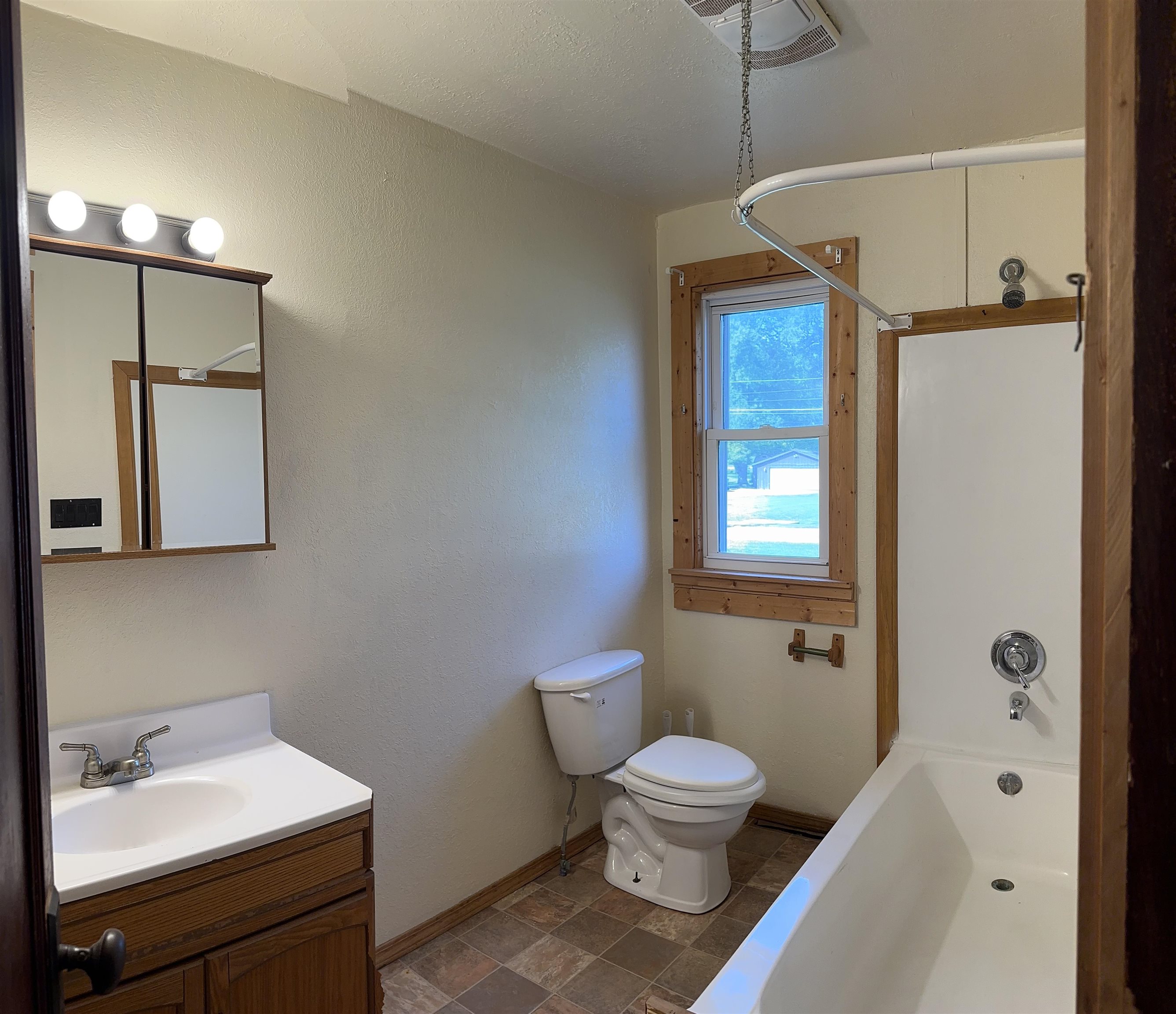 1407 Hawthorne Avenue Savanna, IL 61074 - Photo 11 of 20 a bathroom with a toilet sink and mirror