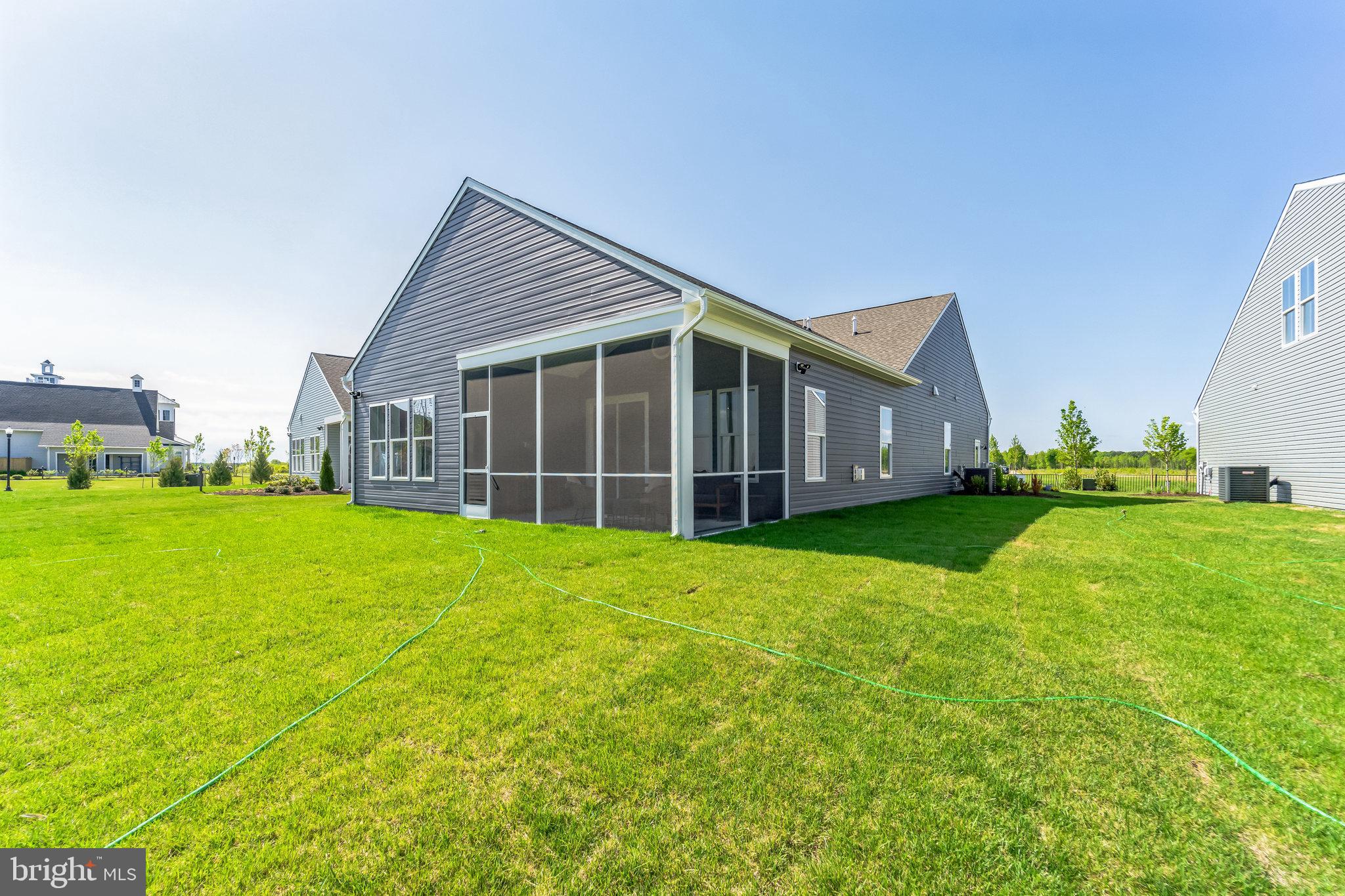 127 Flycatcher Way Stevensville, MD 21666 - Photo 24 of 49 a view of an house with backyard space and garden