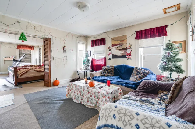 a living room with furniture and a couch