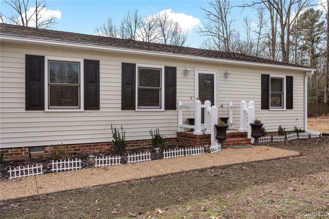 10111 Cattail Road Chesterfield, VA 23838 - Photo 2 of 31 a view of a house with a patio