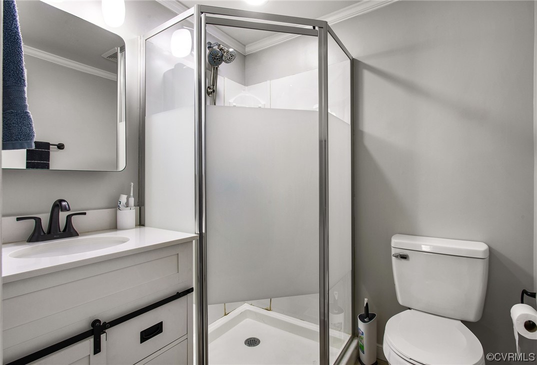 10111 Cattail Road Chesterfield, VA 23838 - Photo 24 of 31 a bathroom with a granite countertop sink toilet and shower