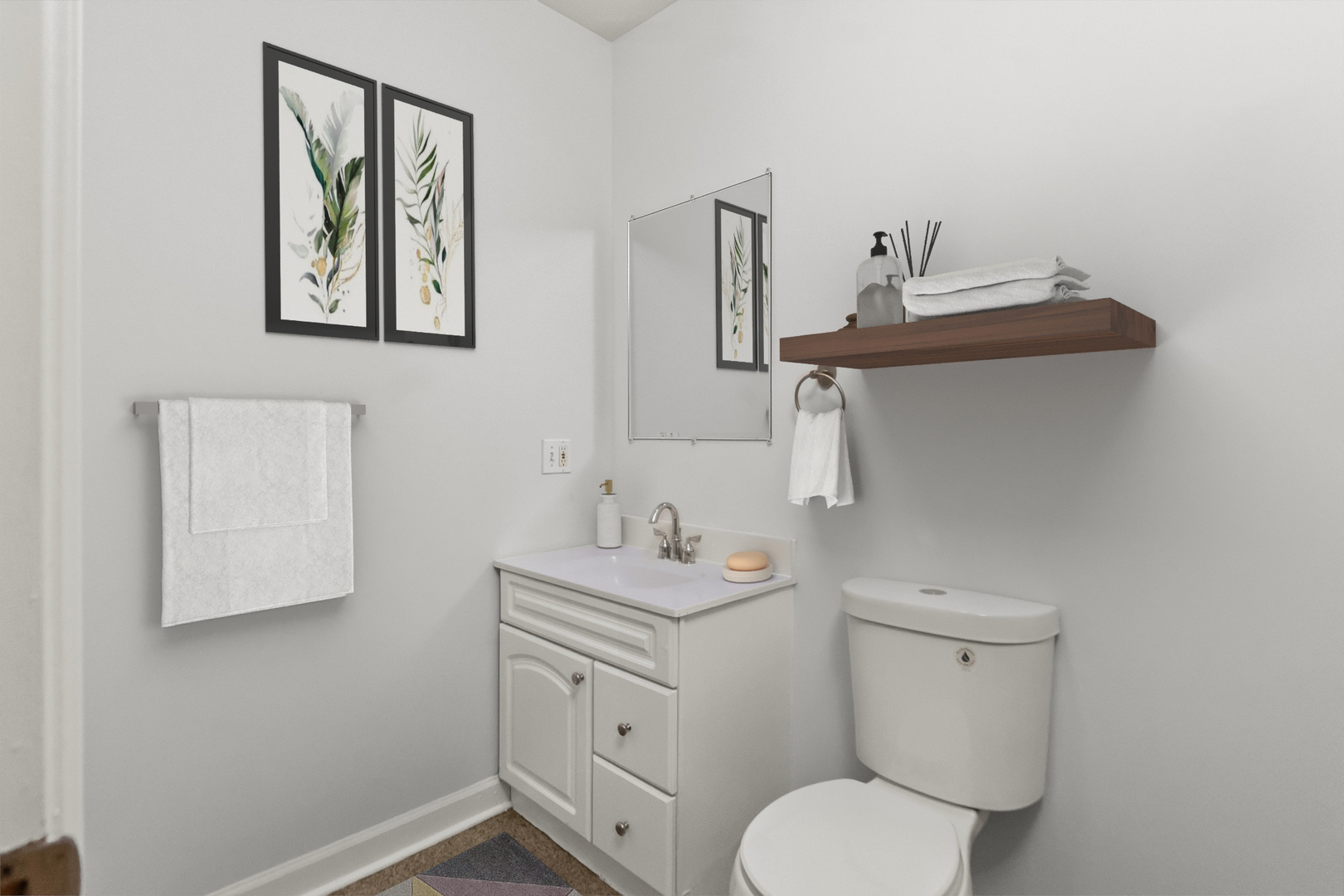 1628 West Juneway Terrace, Unit 1 Chicago, IL 60626 - Photo 13 of 49 a bathroom with a toilet sink and mirror