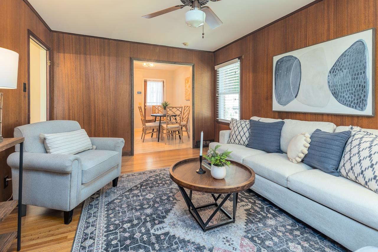 4696 Kaye Road Memphis, TN 38117 - Photo 16 of 39 a living room with furniture and a wooden floor