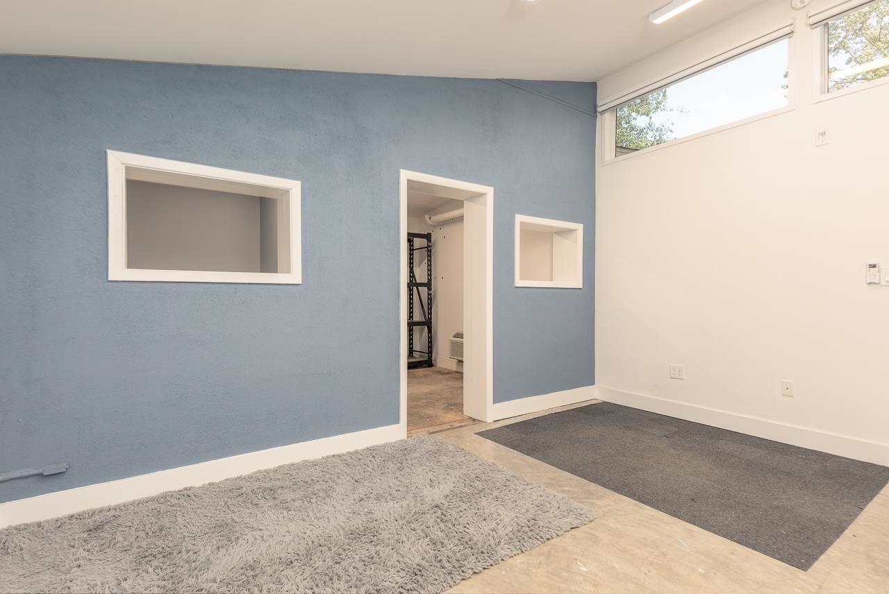 4696 Kaye Road Memphis, TN 38117 - Photo 33 of 39 a view of an empty room with wooden floor and a window