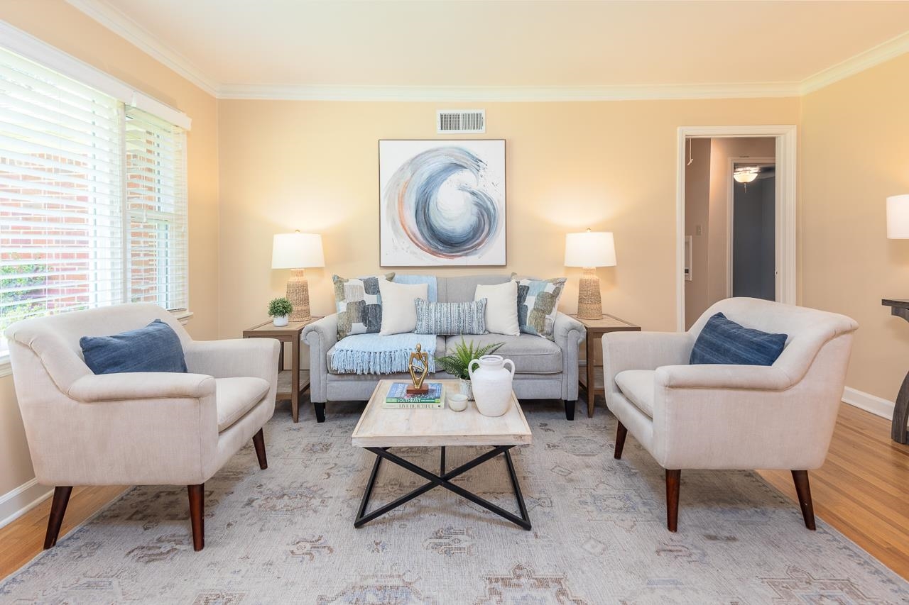 4696 Kaye Road Memphis, TN 38117 - Photo 5 of 39 a living room with furniture a rug and a window