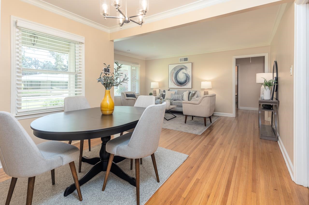 4696 Kaye Road Memphis, TN 38117 - Photo 6 of 39 a view of a dining room with furniture and wooden floor