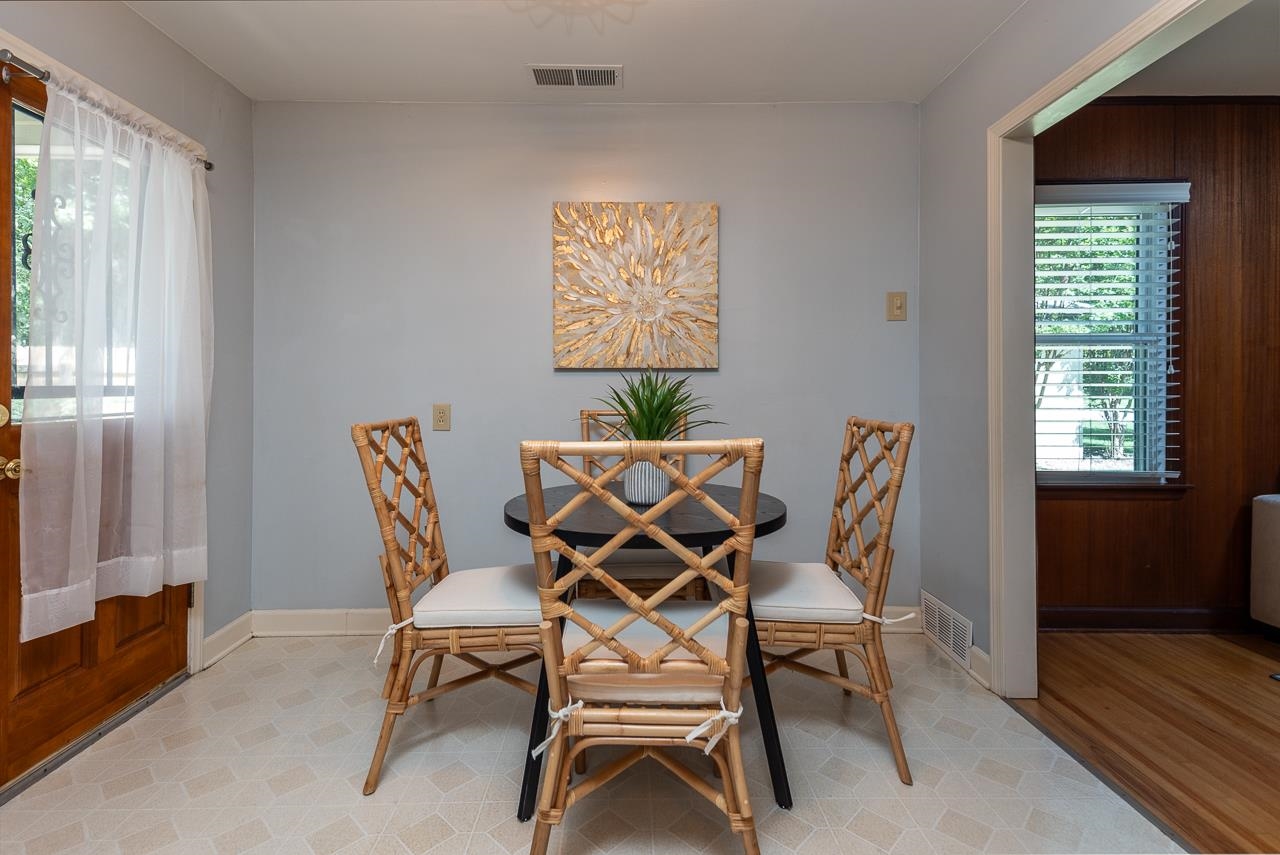 4696 Kaye Road Memphis, TN 38117 - Photo 9 of 39 a view of a dining room with furniture window and wooden floor