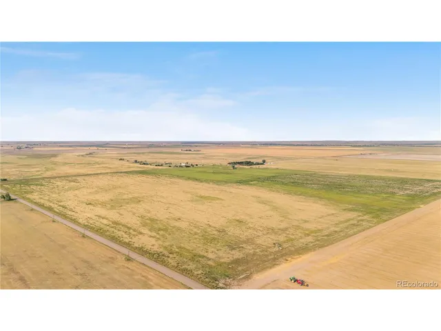 a black and white photo of a beach