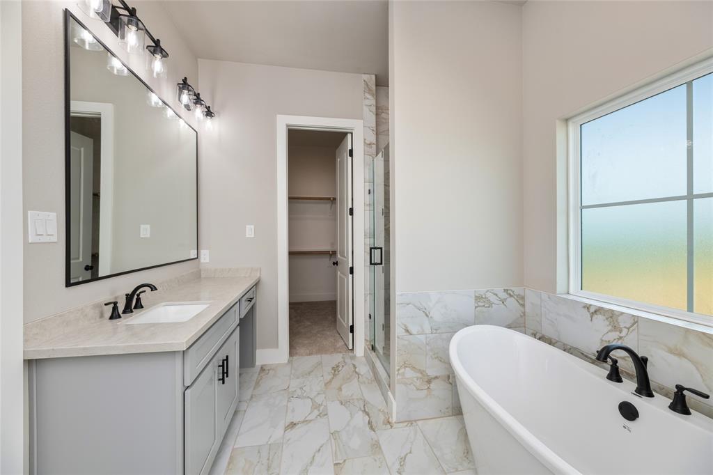 217 Fm 2258 Venus, TX 76084 - Photo 23 of 36 a bathroom with a sink and a mirror