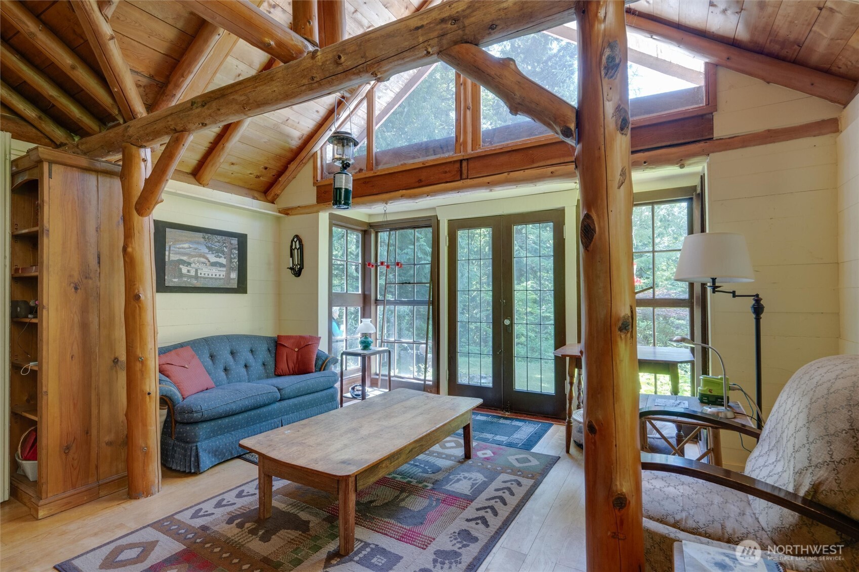 4315 Nordum Road Everson, WA 98247 - Photo 32 of 40 a living room with furniture a rug and a large window