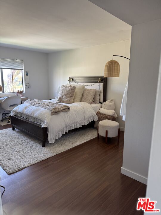 6465 Kanan Dume Road Malibu, CA 90265 - Photo 3 of 14 a bedroom with bed and window