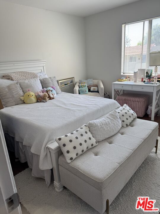 6465 Kanan Dume Road Malibu, CA 90265 - Photo 4 of 14 a bedroom with a bed and window