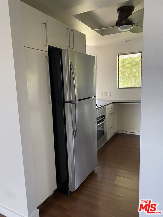 6465 Kanan Dume Road Malibu, CA 90265 - Photo 8 of 14 a metallic refrigerator freezer sitting in a kitchen