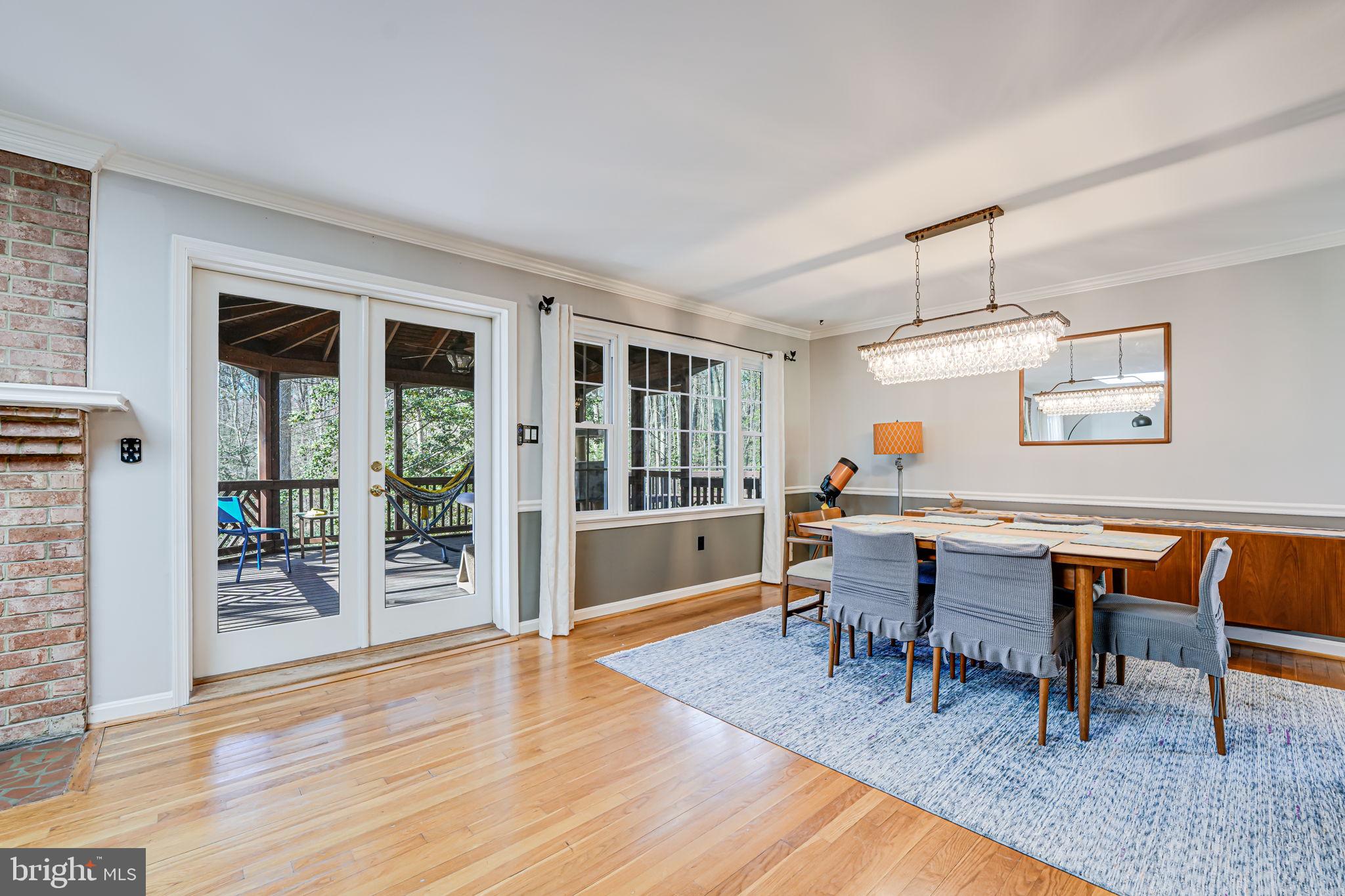 12132 Stirrup Road Reston, VA 20191 - Photo 14 of 67 a view of a dining room with furniture window and wooden floor