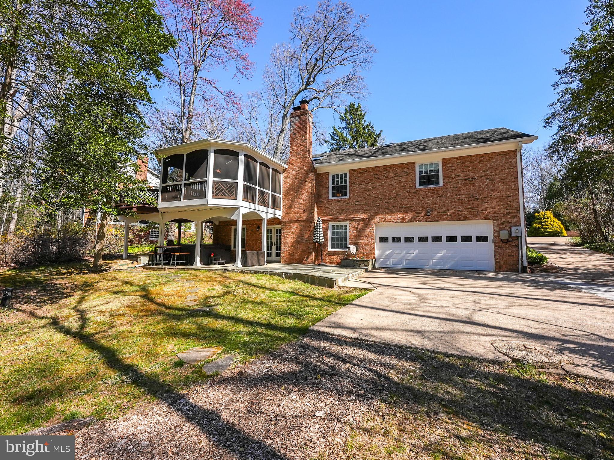 12132 Stirrup Road Reston, VA 20191 - Photo 53 of 67 a front view of a house with a yard