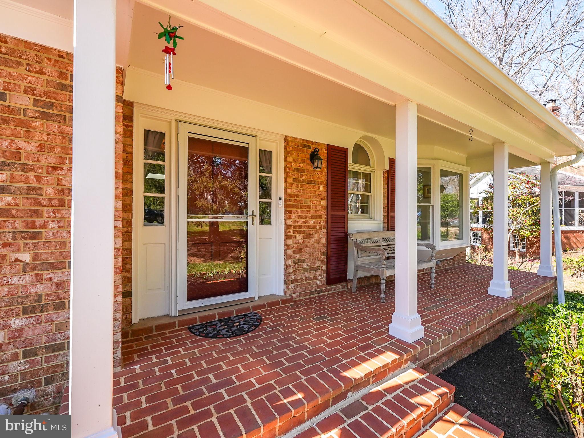 12132 Stirrup Road Reston, VA 20191 - Photo 6 of 67 a front view of a house with a large window