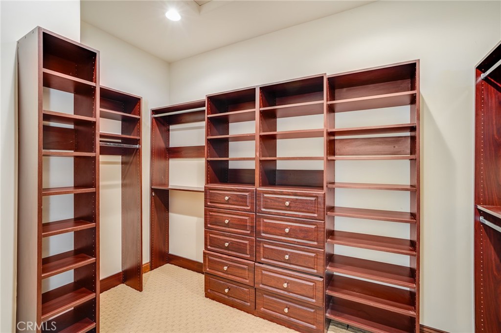 2320 Crestview Drive Laguna Beach, CA 92651 - Photo 16 of 28 a view of walk in closet with empty racks
