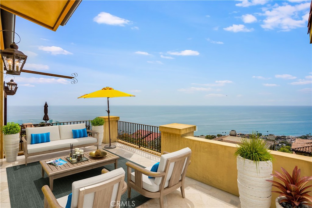 2320 Crestview Drive Laguna Beach, CA 92651 - Photo 2 of 28 a living room with furniture and a table
