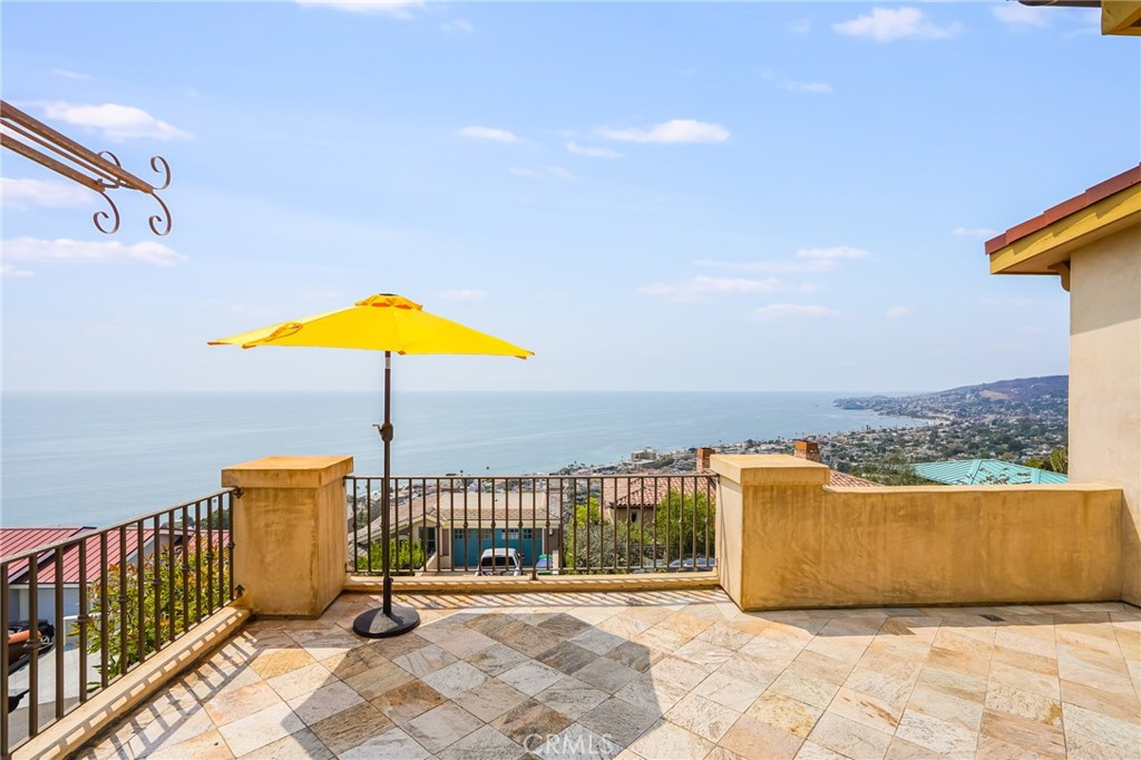 2320 Crestview Drive Laguna Beach, CA 92651 - Photo 28 of 28 a view of a terrace with a lounge chair