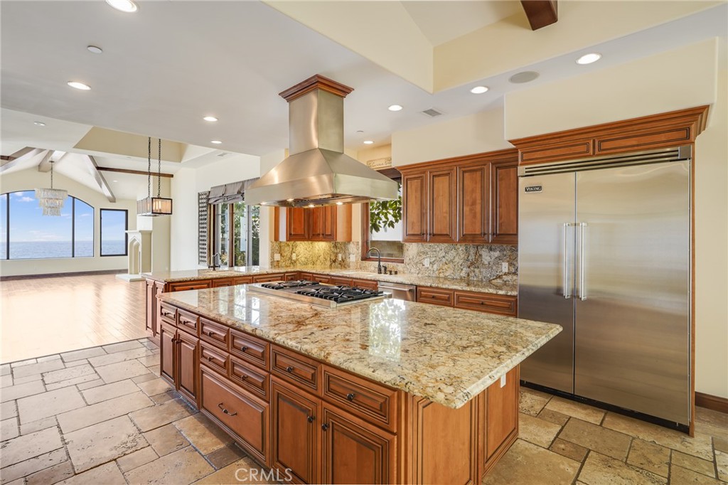2320 Crestview Drive Laguna Beach, CA 92651 - Photo 10 of 28 a kitchen with stainless steel appliances granite countertop a sink and a refrigerator
