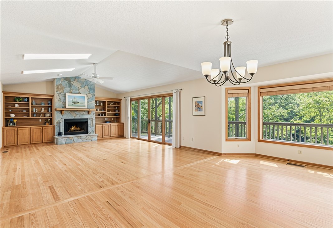 213 Shipmaster Drive Salem, SC 29676 - Photo 2 of 33 This airy living space features a cozy fireplace and expansive windows with wooded views. Virtually staged