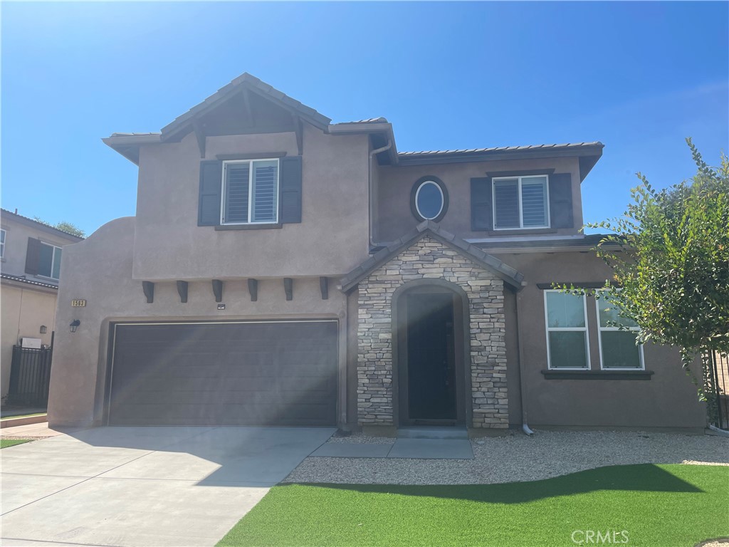 1563 Silver Shadow Drive Thousand Oaks, CA 91320 - Photo 2 of 24 a front view of a house with garden