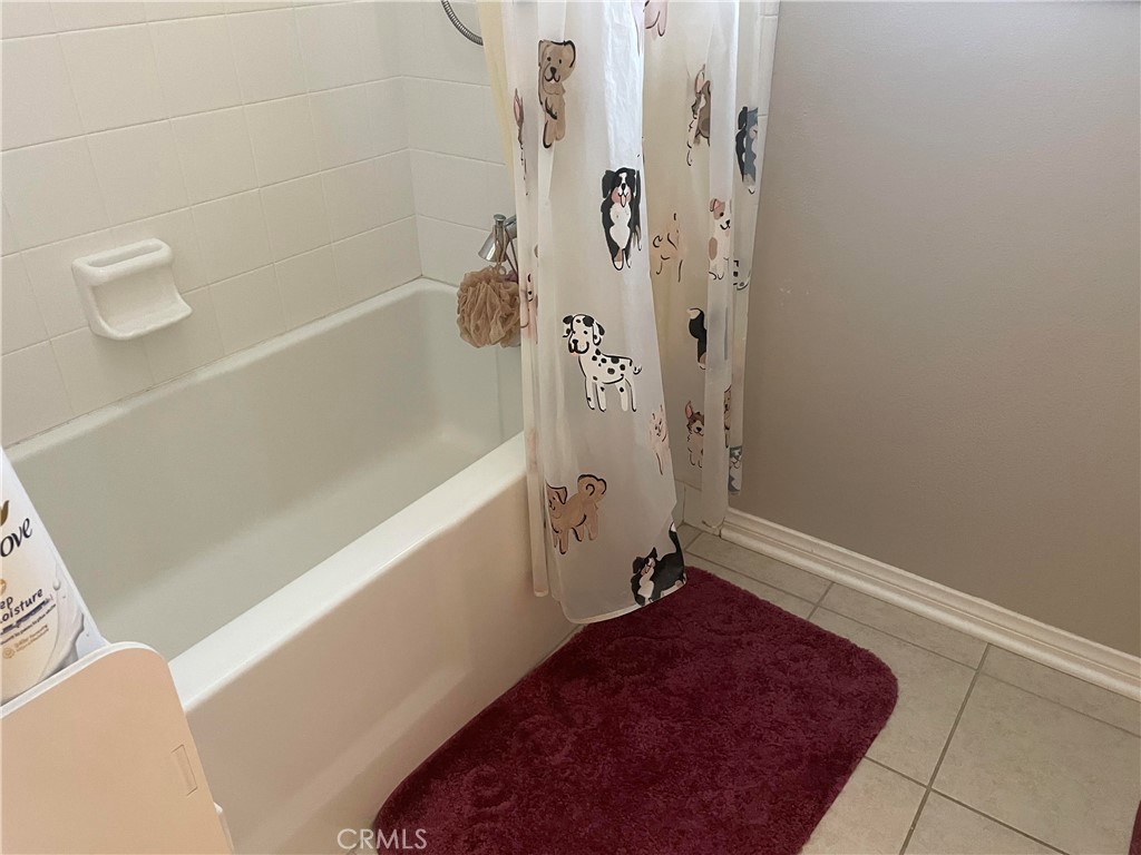 1563 Silver Shadow Drive Thousand Oaks, CA 91320 - Photo 21 of 24 a bathroom with a bathtub and shower